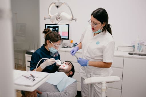 Clinica Dental Delgado logo