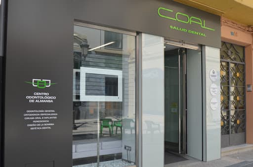 Clinica Dental Dentalcoal logo