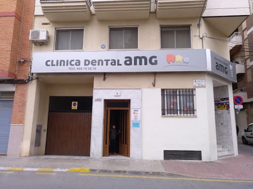 CLINICA DENTAL AMG logo