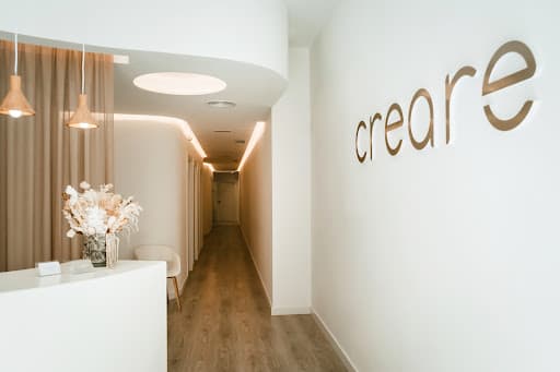 Clinica Dental Creare logo