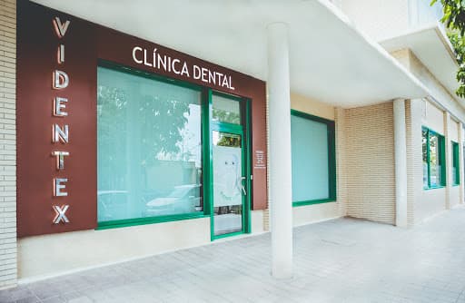Clinica Dental VIDENTEX logo