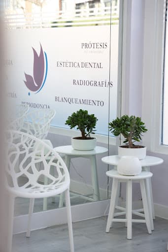 Clinica Dental ODONSALUD logo