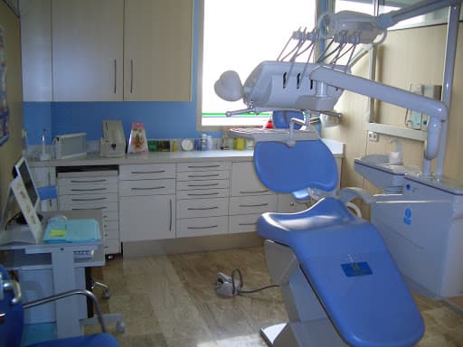 Clinica Dental Medicser logo