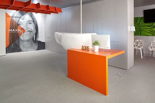 Clinica Dental Maxal logo