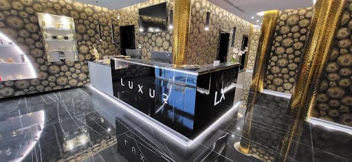 Clinica Dental LUXUR logo