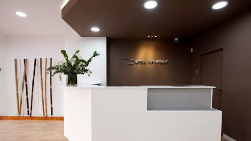 Clinica Dental Manresa logo