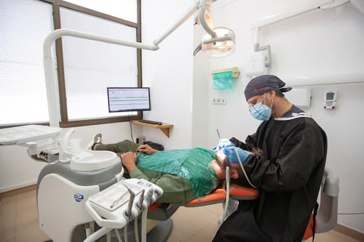 Clinica Dental Mayans logo