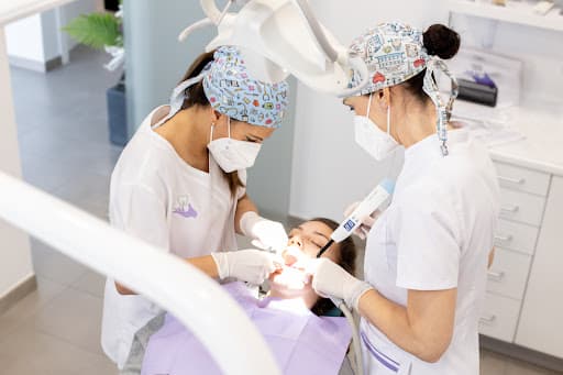 Clinica Dental SanaSalud logo